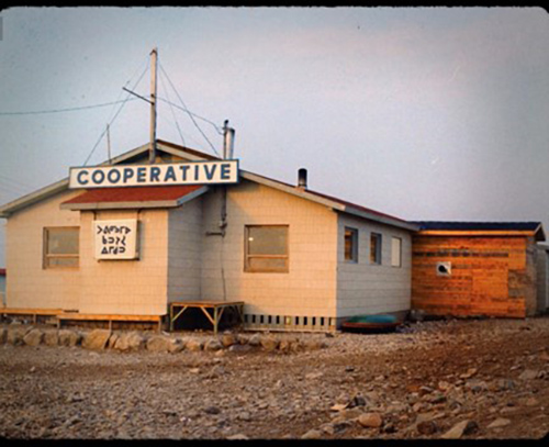 FCNQ archives showing a community cooperative building
