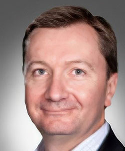 Photo du sous-ministre adjoint aux Communications et aux Affaires publiques, Charles Slowley.