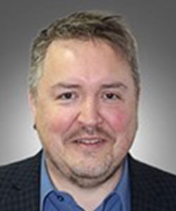 Photo du secrétaire général du Secrétariat général, Kyle J. McKenzie.